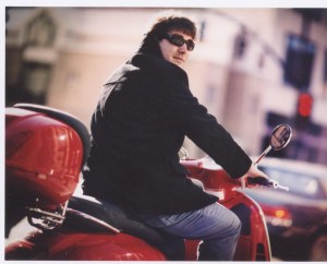 Dan and his Vespa troll the Triangle for music.