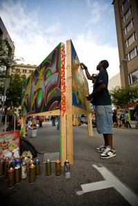 While covering SparkCon for The Raleigh Downtowner, Max Cohen captured this image of an artist at work on Fayetteville Street.